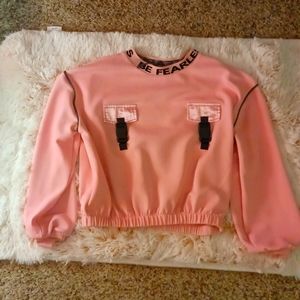 Pink long-sleeved shirt